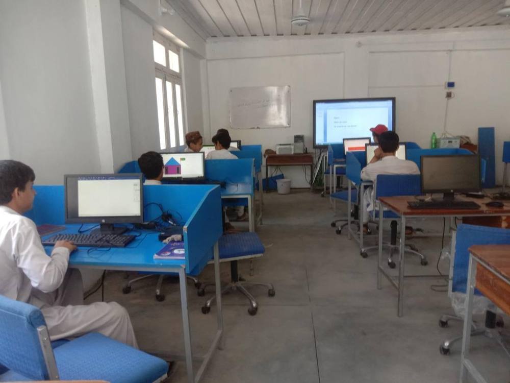 Learning with the smart board — IT Lab, GHS Jijal