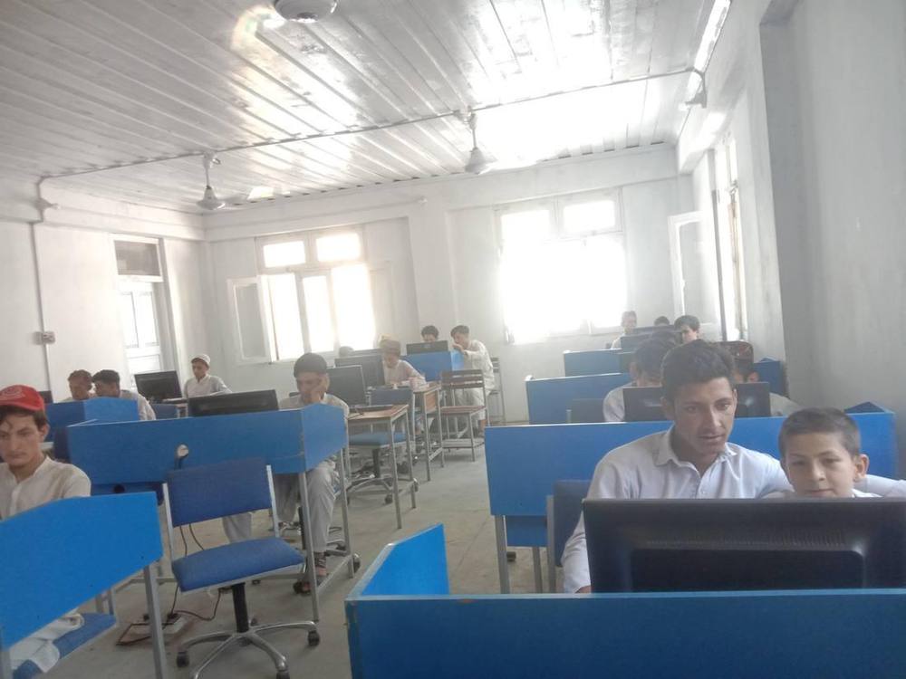 Every student, hands-on — IT Lab, GHS Jijal