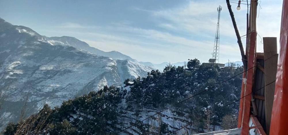 Snow-capped guardians — Dhup Valley, Jijal
