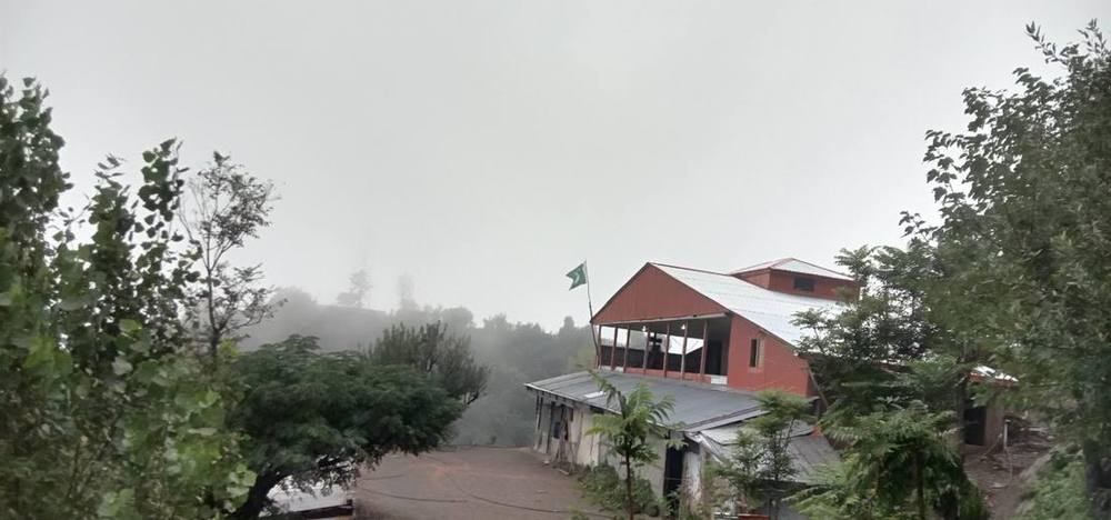 The flag in the mist — Dhup Valley, Jijal